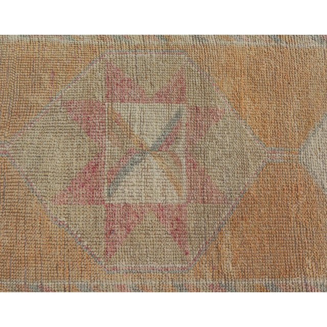 Cream Tribal Medallion Vintage Turkish Oushak Runner in Orange, Blue and Cream For Sale - Image 8 of 11