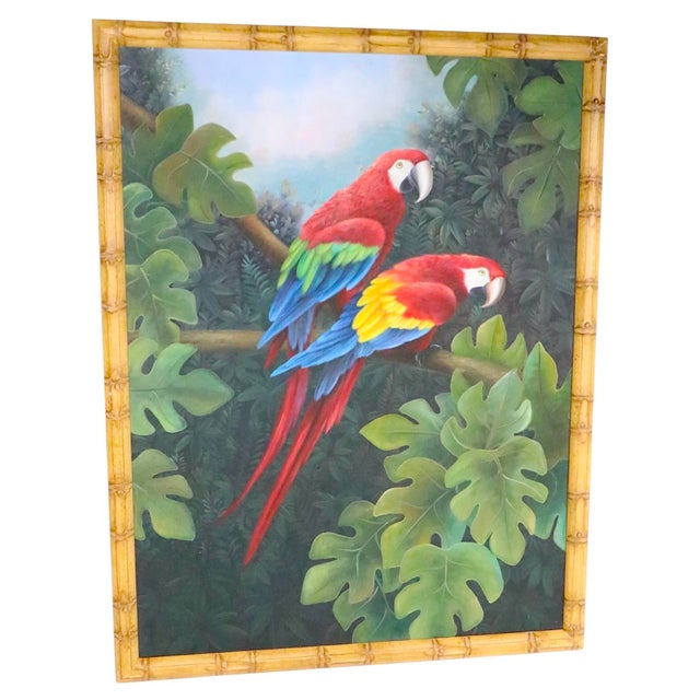 Decorative acrylic painting on canvass depicting two brightly colored Scarlet macaws, set in a lush tropical setting. The...