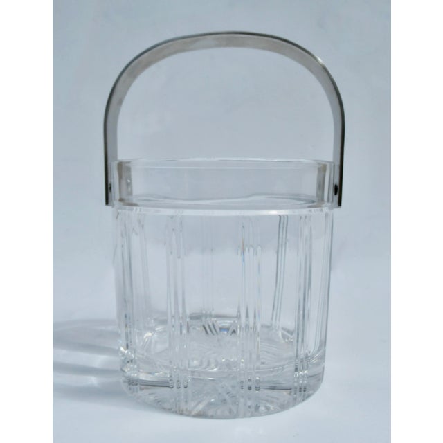 C.1980's Italian leaded crystal, solid and heavy ice bucket with polished nickel handle. Cable knit like design pattern...