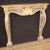 Italian fireplace from the second half of the 20th century. Front fireplace decoration in carved, lacquered and gilded...