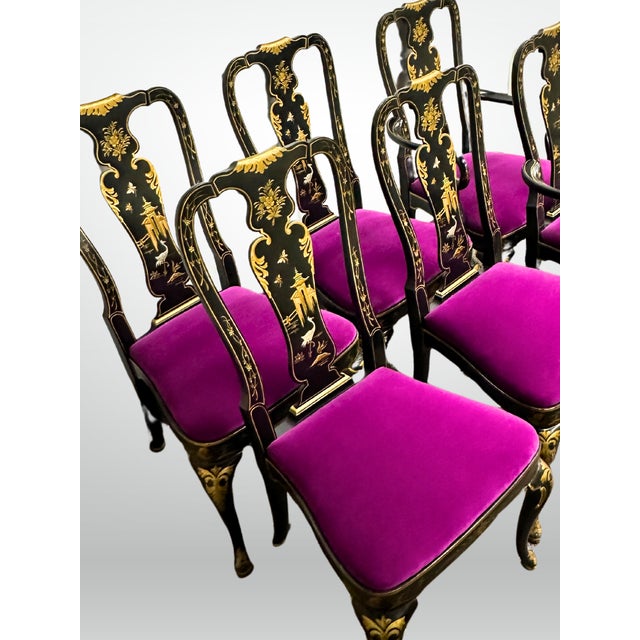 Stunning set of 6 dining chairs, including 2 arm chairs made by Kindel Furniture. Painted black, with intricate gold hand...