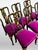 Stunning set of 6 dining chairs, including 2 arm chairs made by Kindel Furniture. Painted black, with intricate gold hand...