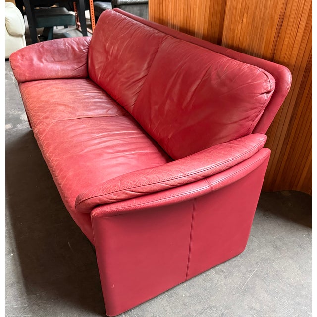 "Bora Bora" Sofa, in supple red leather, manufactured in the 1980s by Dutch quality brand Leolux. This piece is attributed...