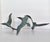 Vintage patinated cast iron sculpture of three birds in flight. Suitable for wall (with hanging hook) or standing on its...