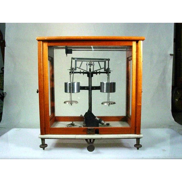 Germany hand-built analytical beam balance scientific scale by Galileo Sartorius. The scale is used to measure both solid...