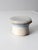 This vintage studio pottery butter keeper features a softly speckled cream glaze accented by bands of pale blue and...