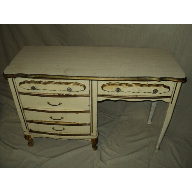 Elevate your workspace with this exquisite Mid-Century French Provincial writing desk by renowned Canadian manufacturer...