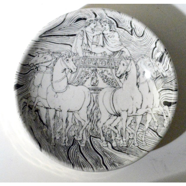 Classical Speed: Fornasetti's Roman Chariot Ceramic Ashtray Object: Ashtray (or vide-poche) Designer: Piero Fornasetti...
