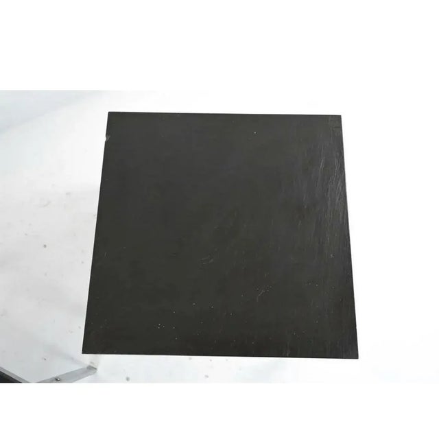 Mid century modern square low side table or coffee table with chrome base and heavy natural slate top, in the manner of...