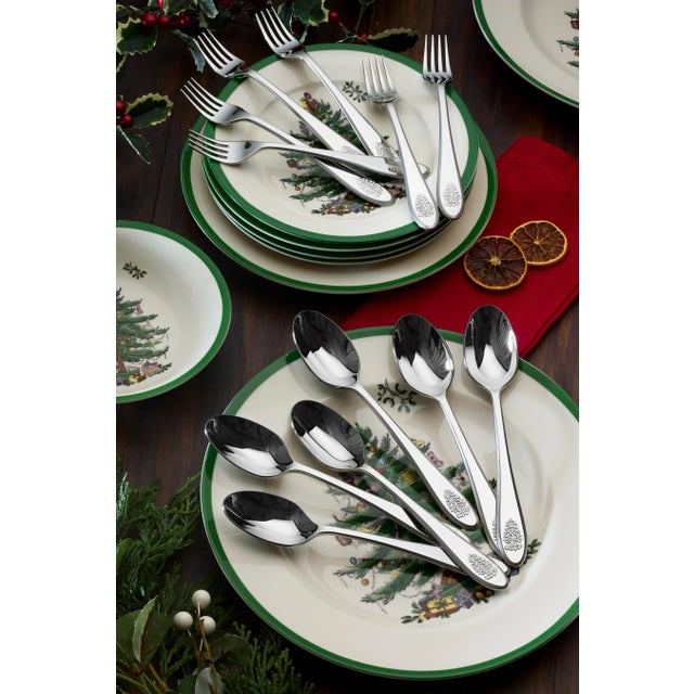 Spode Christmas Tree Set of 6 Dessert Spoons are crafted of 18/10 stainless steel and decorated with an embossed Christmas...