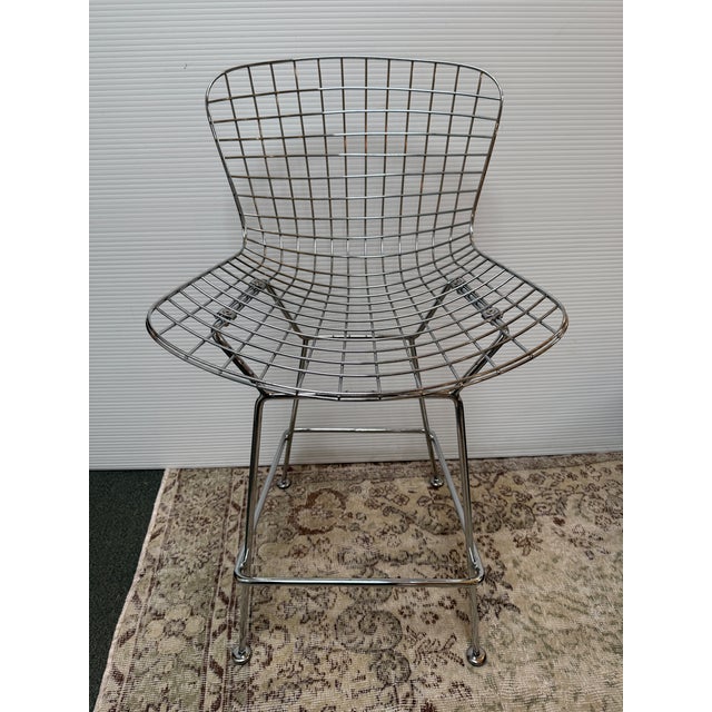 Design Plus Gallery presents a Bertoia Style Caged Wire Bar Stool. The stools sturdy chrome wire base provides a durable...