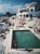 "Eden Roc Pool", French Riviera 1976, 40" x 60" C-Print by Slim Aarons A sun-drenched glimpse into the effortless glamour...