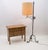 Adjustable wrought iron floor lamp attributed to Raymond Subes. The lampshade can be adjusted in height four times....