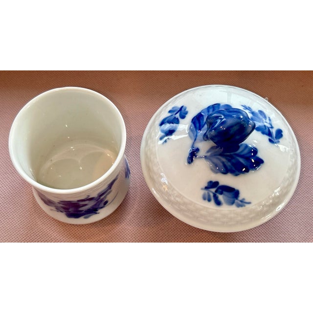 Royal Copenhagen Blue Flower Braided Porcelain Sugar Bowl and Bouillon Cup. In perfect condition. Sugar bowl measures:...