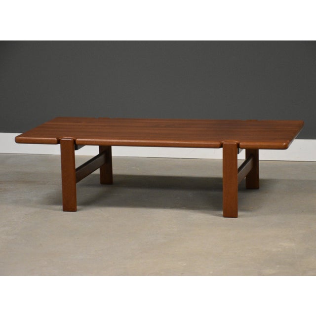 A mid century modern solid teak coffee table by Niels Bach. Made in Denmark. Professionally refinished. Circa 1960’s....