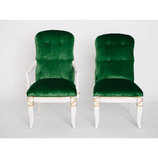 A fabulous set of ten Marge Carson dining chairs. These sturdy and comfortable oak chairs are white painted and gold...