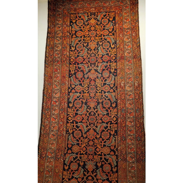 "A stunning 19th century Persian Malayer long runner featuring an allover Herati pattern, handwoven in the late 1800s in...