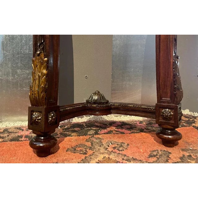Small console in walnut with marble top. Large quantities of carving and execution.