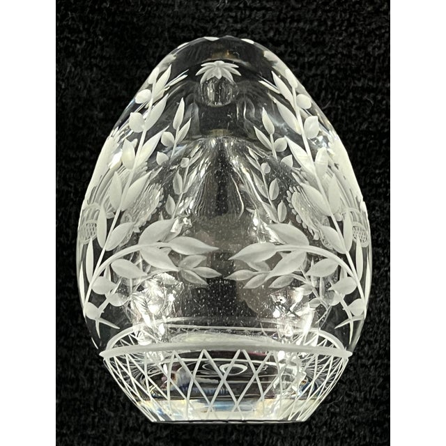 This exquisite vintage Fabergé crystal egg paperweight is a regal accent piece, signed and numbered "Fabergé 0329" near...