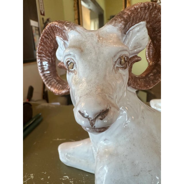 Decorative glazed terra cotta rams. Made in Italy. Beautiful features and soft colors