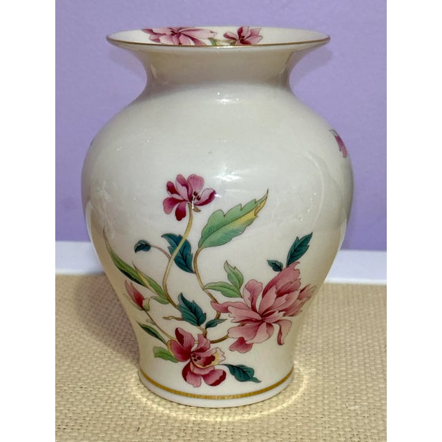 From the Lenox Barrington collection, this vase is so beautiful with delicate flowers and gold trim. It is in excellent...