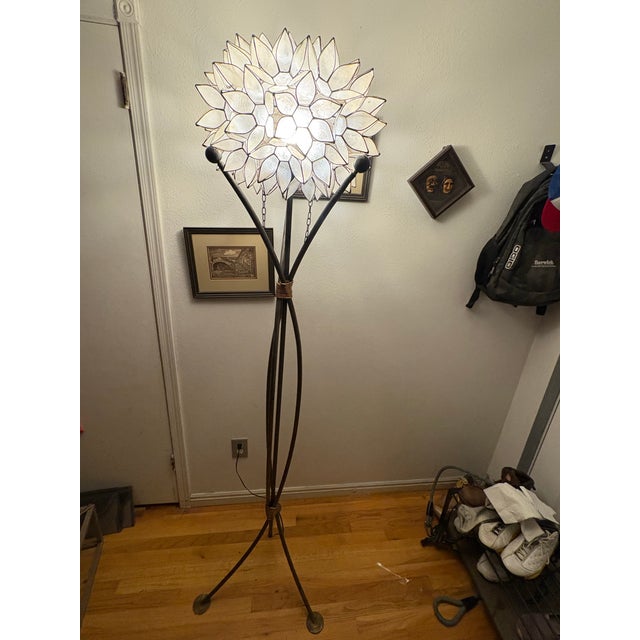 Bring a dramatic, sculptural glow to your space with this exceptional Mid-Century Modern Brutalist "Lotus" floor lamp....