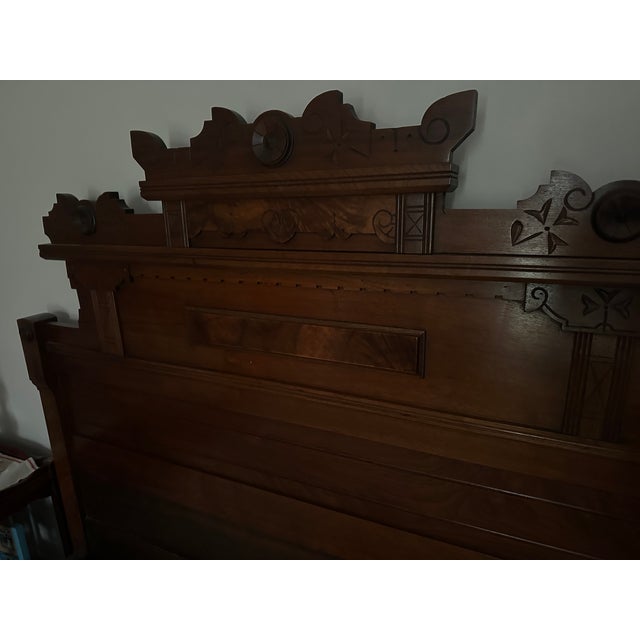 Exquisite vintage bed with hand carved headboard and footboard. This was a gift from an elderly client of mine at least 30...