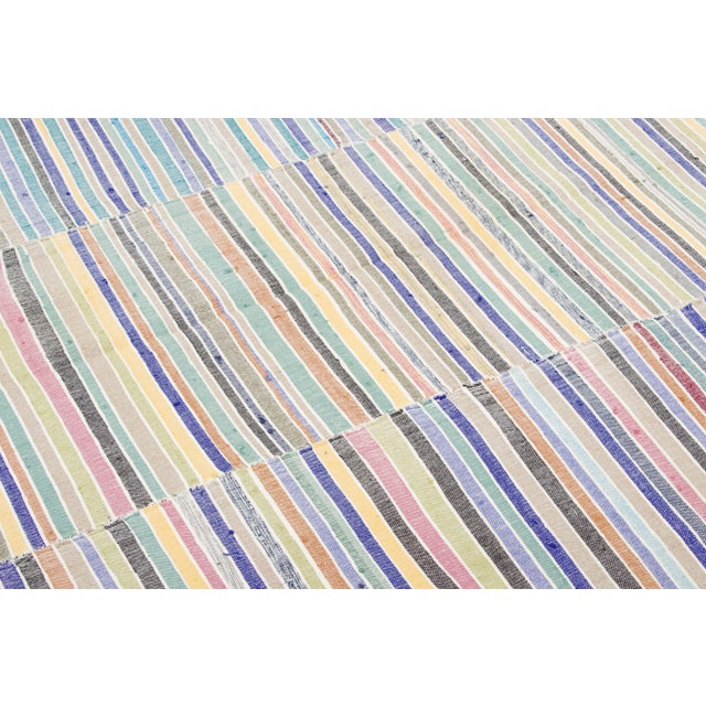 Handwoven in pure wool and originating circa 1950-1959, this 6x8 vintage Turkish kilim rug joins Rug & Kilim’s Kilim &...