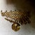 A vintage Eastern European seven-branch brass menorah is a traditional Sabbath or temple-style candelbrum typically...