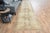 This vintage hand-knotted RUNNER rug is a semi-antique vintage area rug. The '70s Eastern region of Anatolian's unique rug...