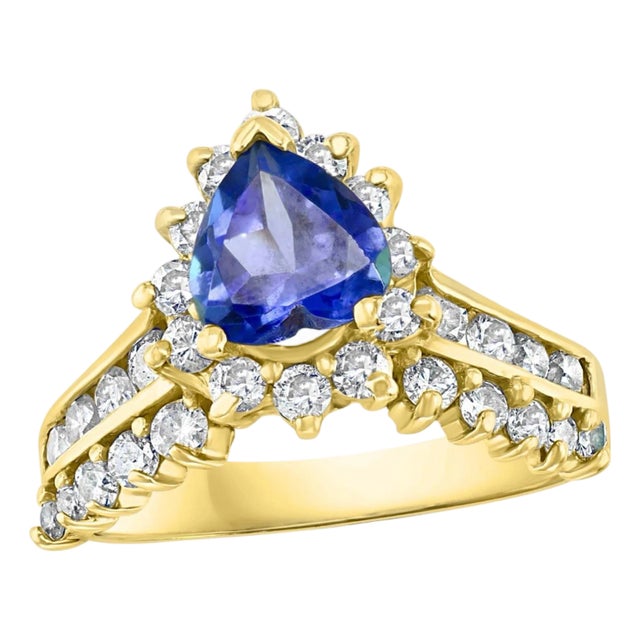 1.25 Carat Heart Shape Tanzanite and 1.5 Carat Diamond Ring 14 Karat Yellow Gold For Sale