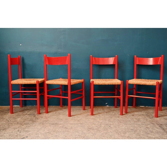 These charming chairs reflect the spirit of 1960s Italian design: turned wood, bold colors, and handcrafted weaving for a...