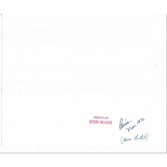 1971 black and white photo by Los Angeles based photographer Don Ware of Grande Hotel Du Louvre. The hotel occupies the...