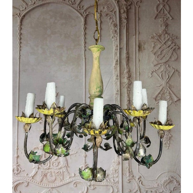 An exceptionally charming and rare vintage Italian Tole chandelier in a coveted 10-light configuration, a true work of art...