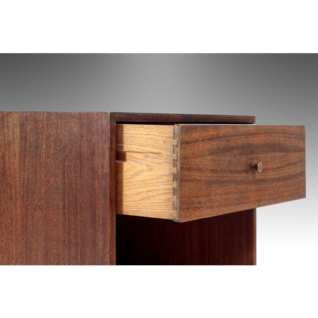 Equal parts functional and aesthetically pleasing this perfectly minimalist set of end tables, designed by Harvey Probber,...