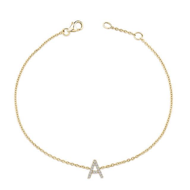 Immerse yourself in the understated elegance of this 10K yellow gold bracelet, for an enrapturing shimmer that captures...