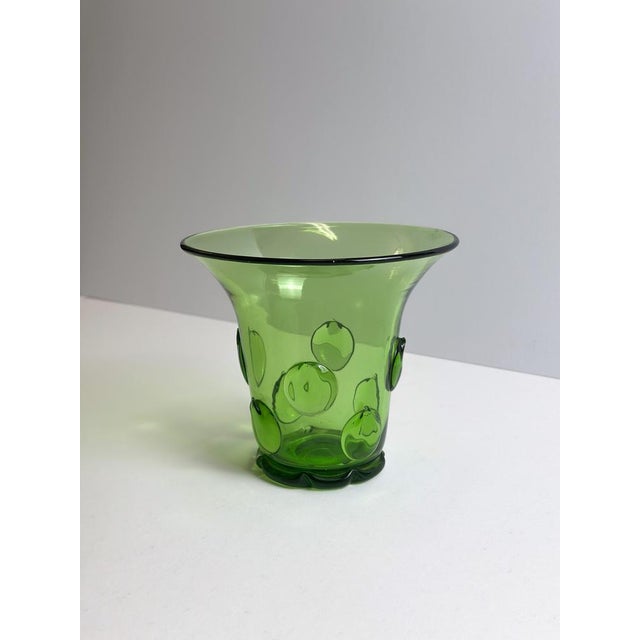 This 1924 green glass vase was designed by Wolfgang von Wersin for Tiroler Glashtte, an early and refined example of...