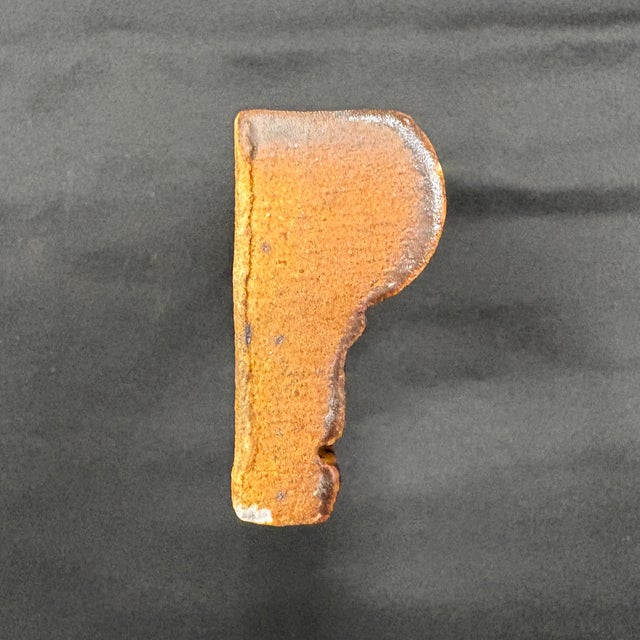 1-7/8" x 6" ceramic rail molding with a burnt umber glaze and natural matte finish. Moldings are handmade and hand glazed,...