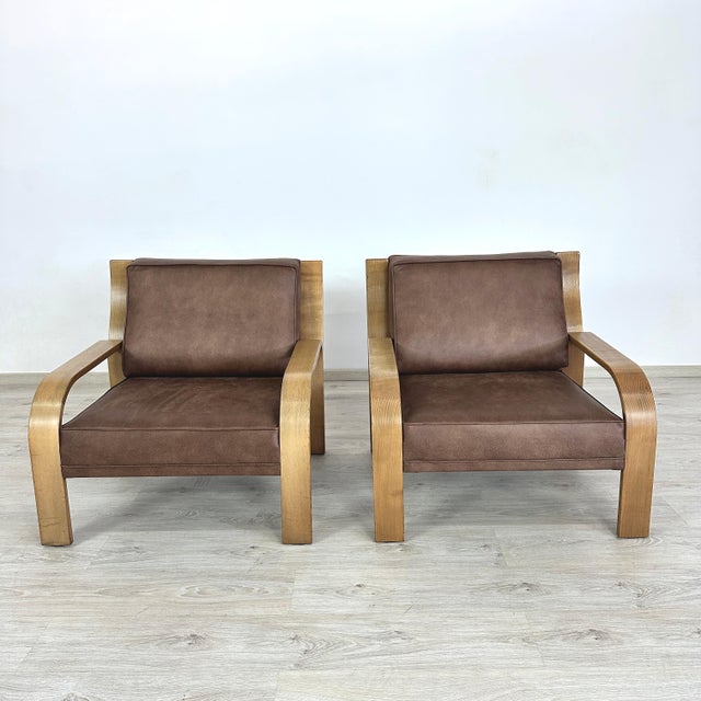 Dimensions: H 30.5” x W 32.5” x SD 21” x SH 15.7” Pair of Vintage German lounge chairs designed by Walter Knoll, newly...