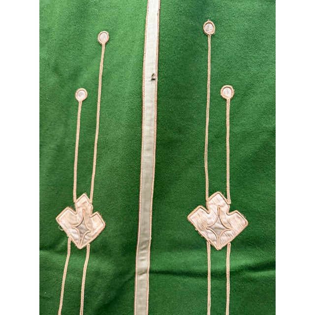 A rare, breathtaking pair of circa 1880–1920 French architectural portières hand-crafted from finely woven forest green...
