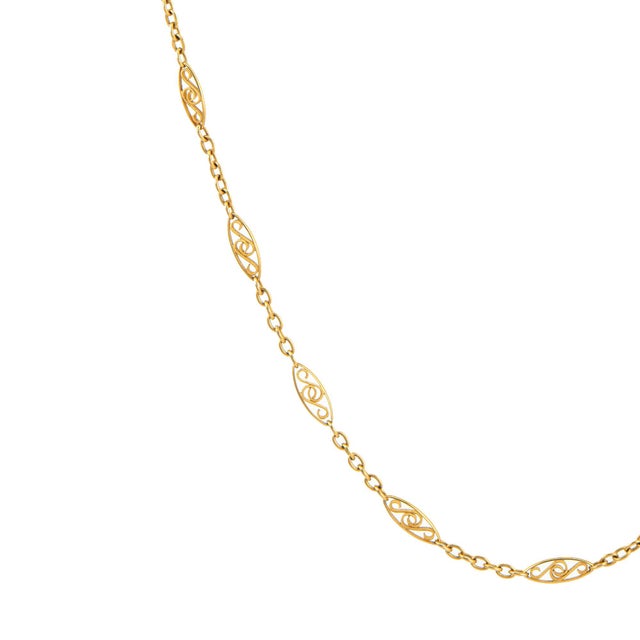 Stylish antique Portuguese Long Guard necklace crafted in 19k yellow gold (circa 1888 to 1937). Crafted in bright buttery...
