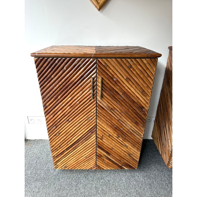 Mid-Century Modern Pair of wood and marquetry of large rattan malacca bamboo section, brass base and handles buffets...