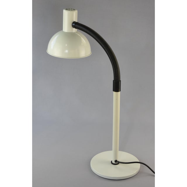 A rare early Bunker table lamp designed by Jo Hammerborg for Fog & Mørup, Denmark, dating from the 1960s. This distinctive...