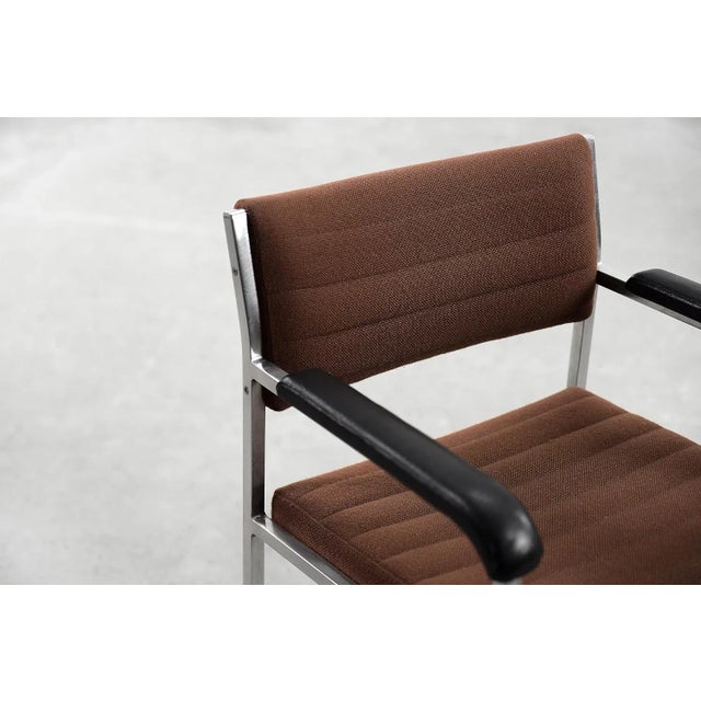 This pair of modernistic armchairs was produced by the German manufactory Fröscher Sitform during the 1970s. The frame is...