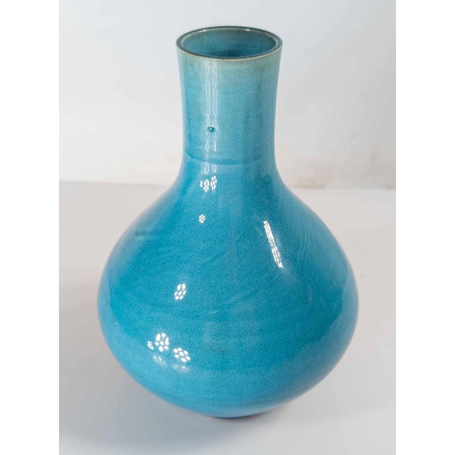We are selling this great Japanese electric blue turquoise glazed vase. This vase has nice globular form in the Chinese...
