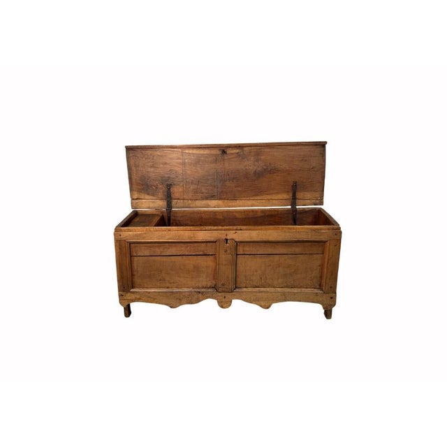 A beautiful 18th-century walnut mountain chest, featuring a solid, sturdy structure, typical of furnishings found in...