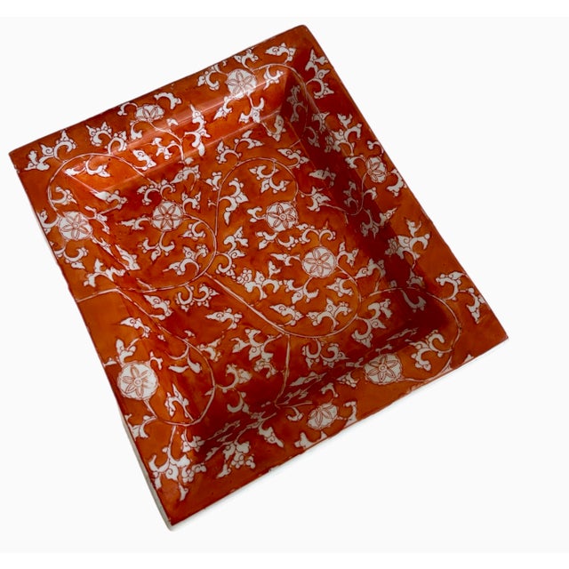 Chinoiserie floral tray in a cinnabar/rust tone by Tozai Home.