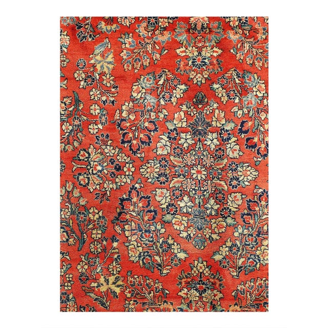 Antique Persian Sarouk rug with Art Nouveau style features an impressive all-over floral design rendered in a rich color...