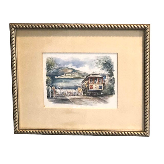 Set of 2 prints. San Francisco’s Golden Gate Bridge and Cable Cars by Jegar. Frame and prints are in excellent condition....