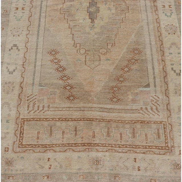 Tan Vintage Oushak Rug From Turkey With Muted Colors and Tribal Medallion For Sale - Image 8 of 11